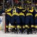The Michigan ice hockey team huddles together before the game against Michigan State at Joe Louis Arena on Saturday, Feb. 2. Daniel Brenner I AnnArbor.com